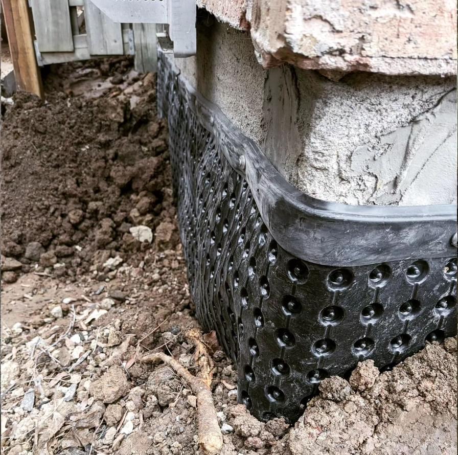 hand-excavated-exterior-waterproofing,-window-well-installation-and-deck-removal-oakville